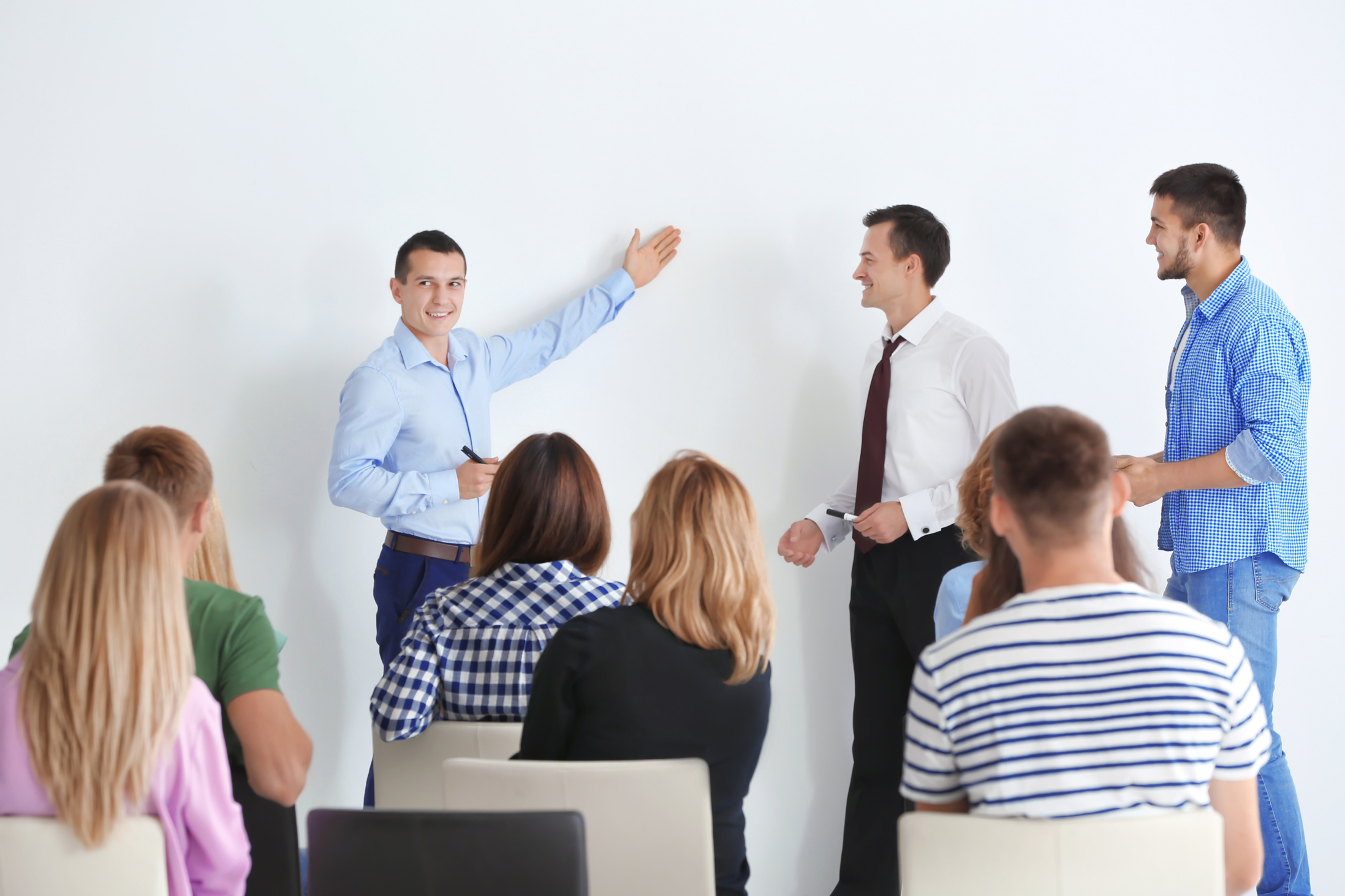Group of People with Business Trainer at Seminar